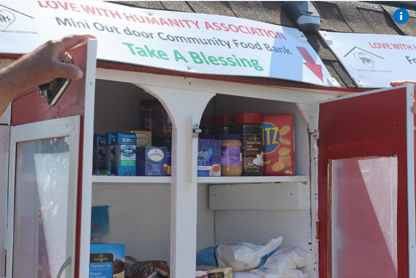 ‘Take a blessing, leave a blessing.’ Why this Calgarian has a mini food bank on his front lawn